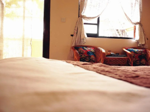 Shaxi Miss May Hotel