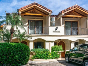 Spacious Open-Concept Condo with Stylish Design, Direct Beach Access & Resort-Style Amenities