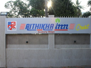 Rithikha Inn crest