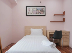 Homey and Modern with City View 2BR Poins Square Apartment