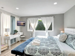Fully Updated Home Sleeps 8 5 Min to the Beach!