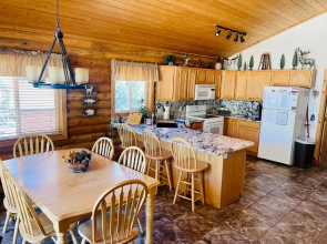 Adventure Awaits 3King Bed,2Bath Log Cabin in heart of Duck Creek Village!