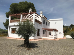 Casa Grande / Rosas Cantares