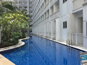 Relax in Pasay City's Best Kept Secret - Spacious Condo With Garden View