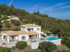 Omolos House in St Stefanos Bay
