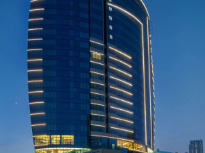Отель Radisson Blu Hotel, Dubai Canal View