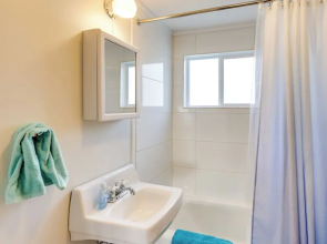 Waterfront Cottage w/ Sunroom + Patio & Grill