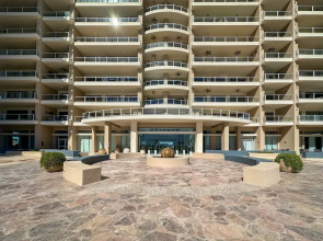 Brand-new Modern 2BR Gem on Iconic Sandy Beach