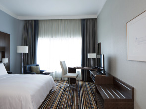 Отель Naumi Dubai