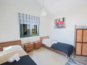 Picture Relaxing Beside Your Private Pool in Protaras Reading Your Favourite Book, Protaras Villa 1320