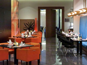 Отель Novotel Suites Mall Avenue Dubai