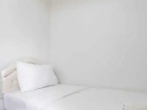 Spacious and Nice 2BR Apartment at Pinewood near JATOS By Travelio