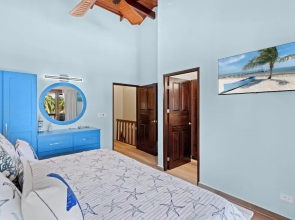 Stylish 2-Bedroom Beach Condo with Ocean-View Deck, Lush Pool Area & 2-Minute Walk to Flamingo Beach