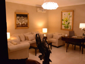 Sandy Le Oriental Hotel