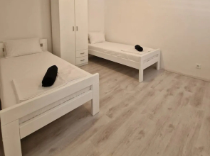 Four Bedroom apt w Patio Close to Beach and Center