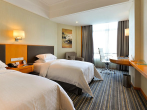 Отель Ramada Plaza by Wyndham Shanghai Pudong Airport