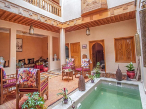 "room in Guest Room - Riad Lakouas Triple Room With Pool View"