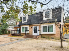 6 Mi to Spectrum Center: Spacious Getaway w/ Deck