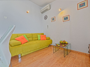 Holiday house Viki - sea view terrace: Postira, Island Brac