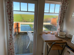 Unser Haus am Deich - Wohnung Meerblick
