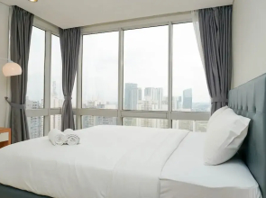 Elegant 2BR at The Empyreal Condominium Epicentrum Apartment