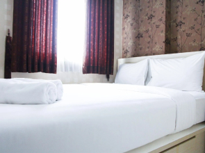 Pool View 2BR Mutiara Bekasi Apartment By Travelio