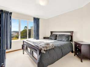 Cheerful 4 bedroom home with free parking.