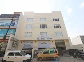 Capital O 30624 Hotel Triton