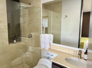 Room-apartasuite Cercana al Aeropuerto i