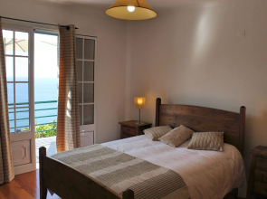 Perched above village with heated pool & ocean views | Casa Jardim Mar