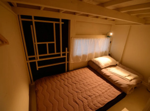 Taketa station hostel cue