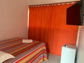 Apartamento com cachoeira no quintal