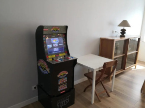 borne d'arcade et 3 salles de bain pour ce T4
