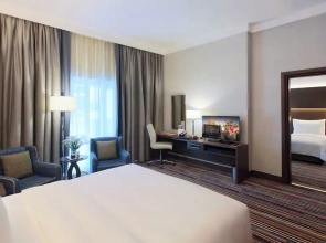 Отель Naumi Dubai