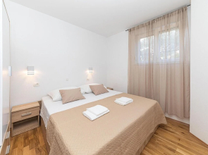 Awesome Apartment in Kastel Gomilica With Outdoor Swimming Pool, Wifi and 2 Bedrooms