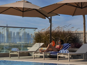 Отель Mövenpick Jumeirah Village Triangle