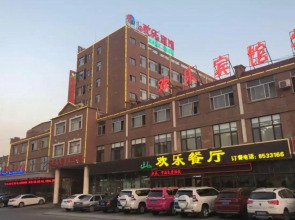 Huanle Business Hotel