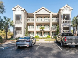 Anchors Away Ii In This Spacious And Beautiful Condo Overlooking Pond And 4th Hole 2 Bedroom Condo by Peace Vacations