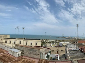 Camere con bagno privato in appartamento condiviso con host