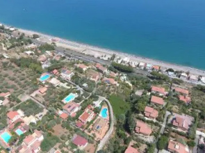 Apartment in villa with pool and garden