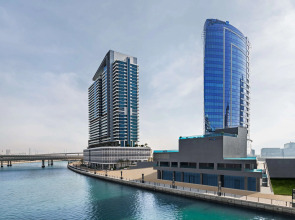 Отель Radisson Blu Hotel, Dubai Canal View