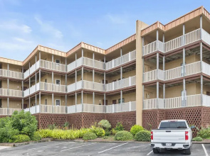 A Wave From It All by Topsail Realty