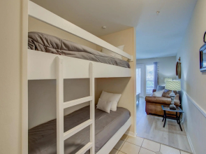 Ground floor condo walking distance to the Beach