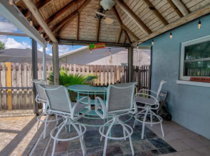 Salt Water Heated Pool Home with a Tiki Bar, a Garage Game Room and 4 Bikes