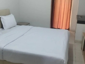 RedDoorz Apartemen @ Green Lake View Cimanggis