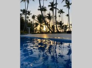 Apartment on the beach with pool and restaurant