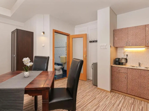 Világóra Apartman