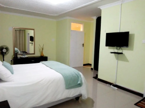 Sago Palm Executive Lodge