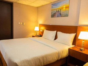 Отель Three 888 Hotel
