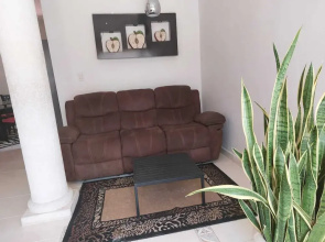 Room in Apartment - Cozy Mérida Retreat With Pool & Garden View